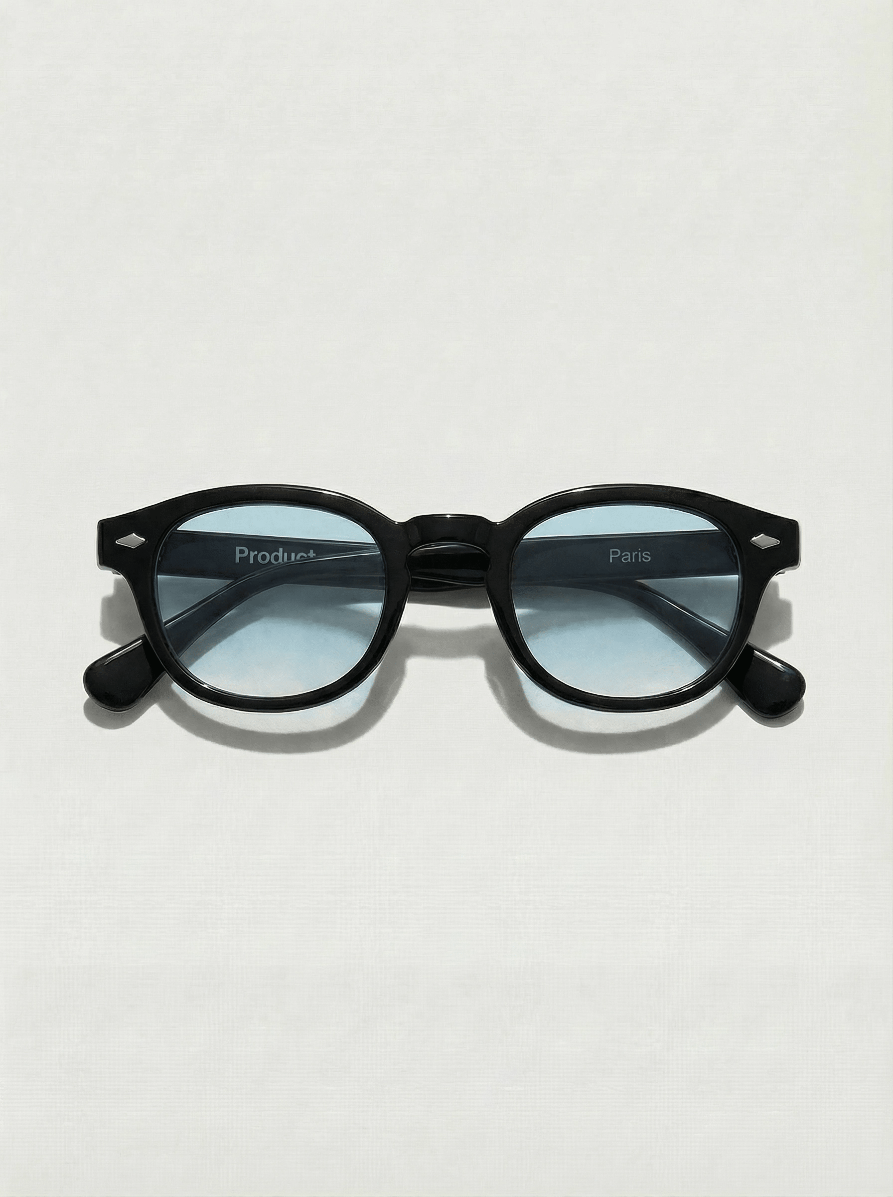 Lunettes de soleil Paris monture noire verres bleu foncé UV400 Product Travel